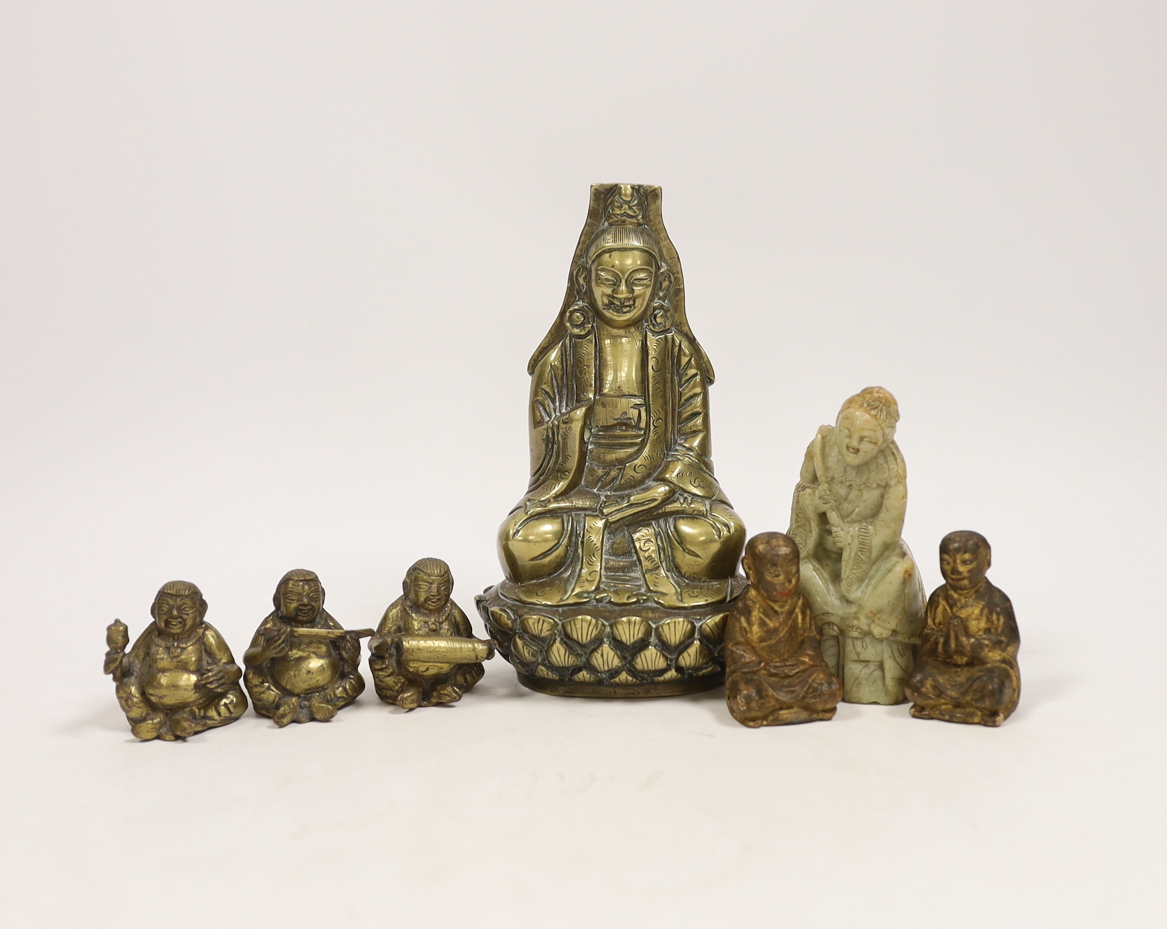 A Chinese bronze Buddha, a soapstone figure, etc, largest 15cm high